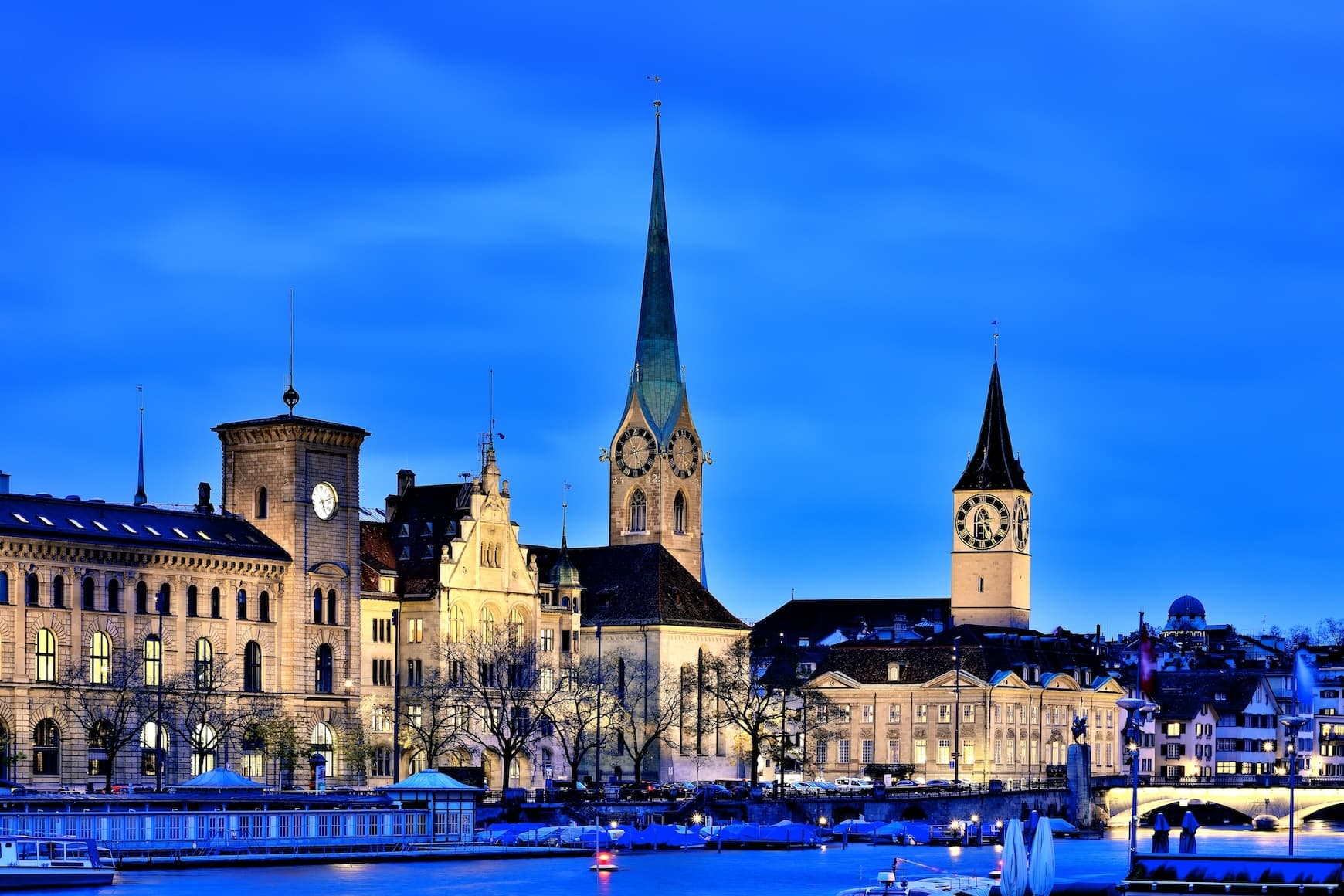 Zurich, Switzerland the home of ELIYA - St. Peter's Church and Old Town Cityscape at Night